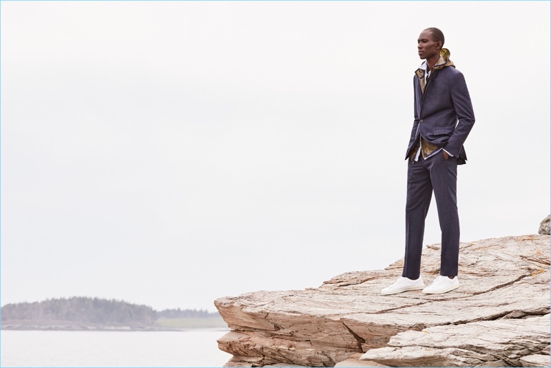 Suit up with J.Crew's Ludlow slim suit jacket $425 and pants $225. Add a sporty component with a New Balance for J.Crew windcheater jacket $85 and leather sneakers $75. Armando Cabral also wears a J.Crew striped oxford shirt $64.50.