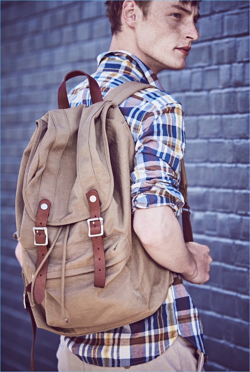 J.Crew makes the case for a backpack with its Harwick style $118. Here, Roberto Sipos models the must-have piece with a J.Crew Madras shirt $54.50 and 484 slim-fit chinos $75.