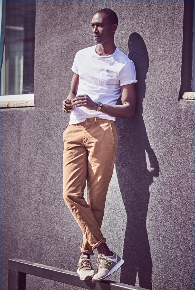 Embrace an effortless t-shirt look with J.Crew's garment-dyed tee $39.50. Armando Cabral wears the timely essential with J.Crew garment-dyed canvas chinos $75 and New Balance for J.Crew 247 sport sneakers $100.