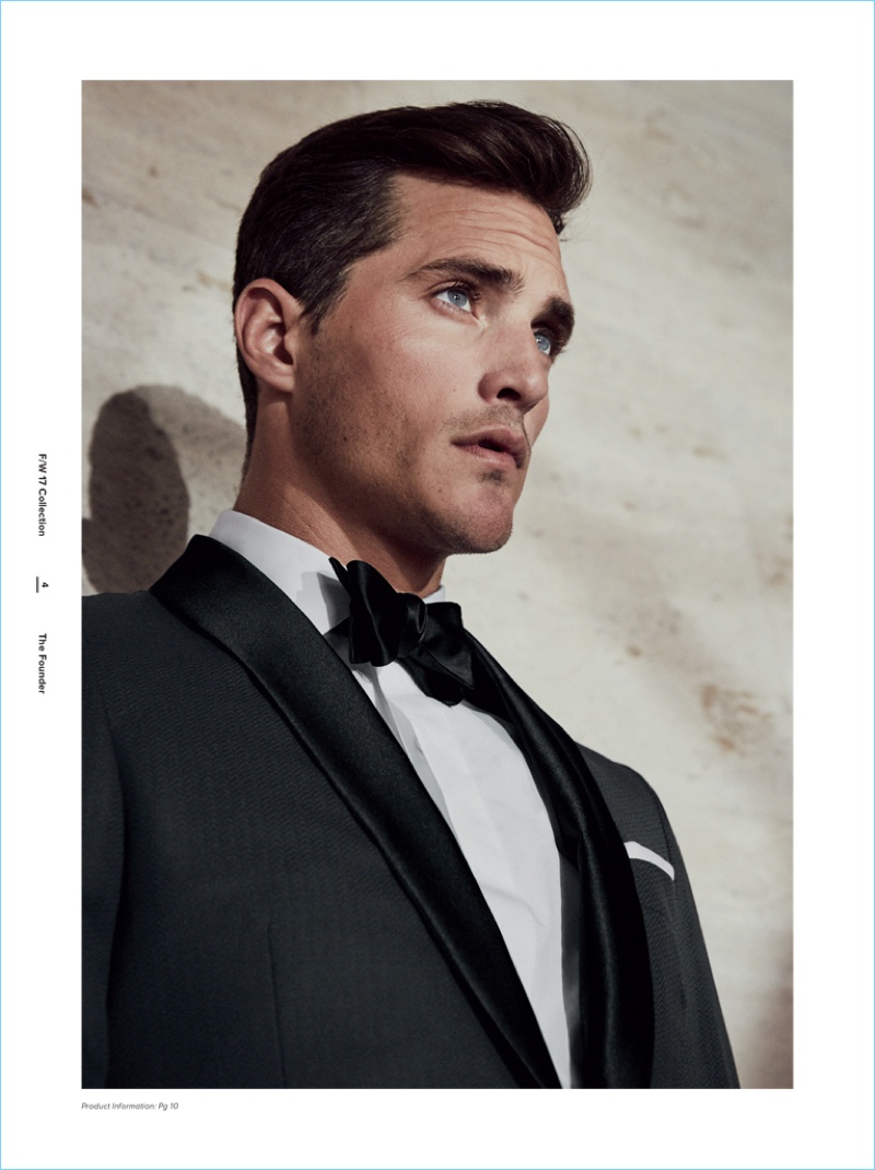 Ollie Edwards dons a sharp tuxedo jacket, dress shirt, and bow-tie from J.Hilburn.