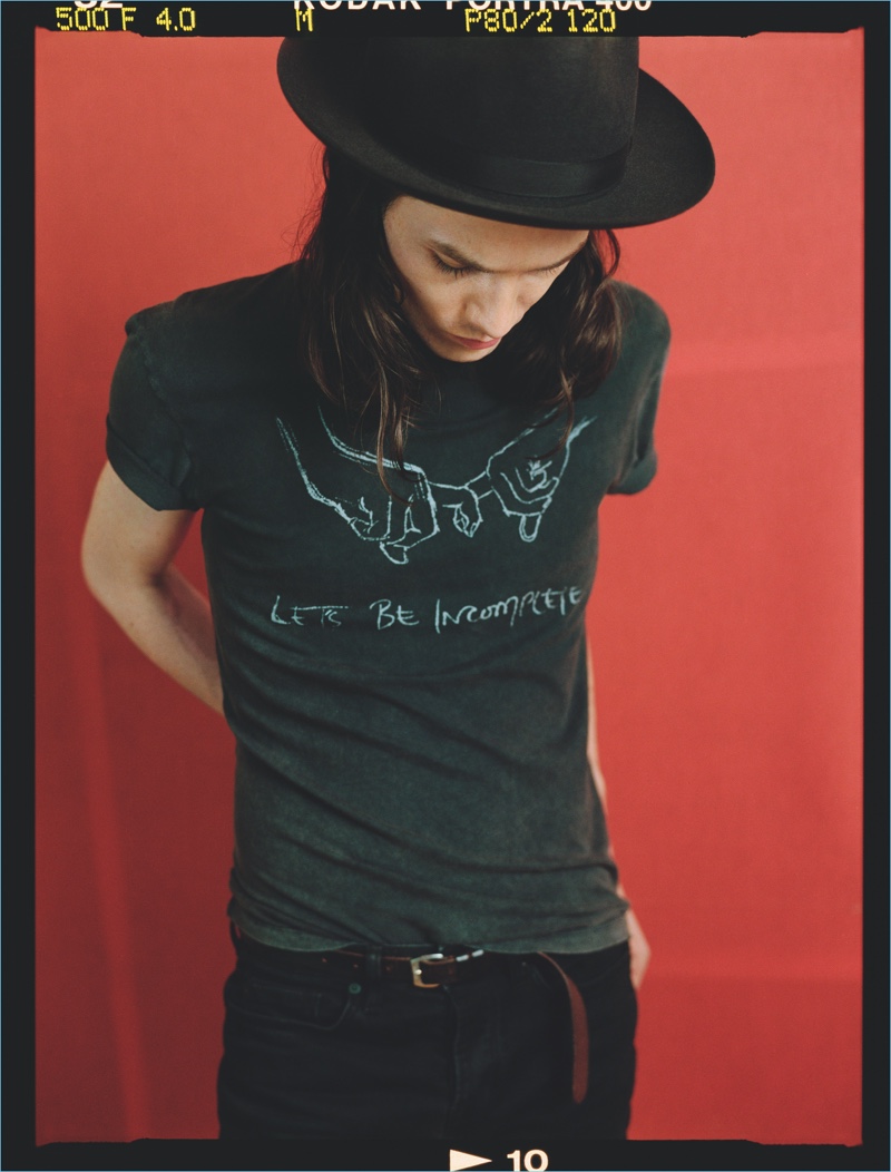 Singer James Bay wears a band t-shirt from his Topman collaboration collection.