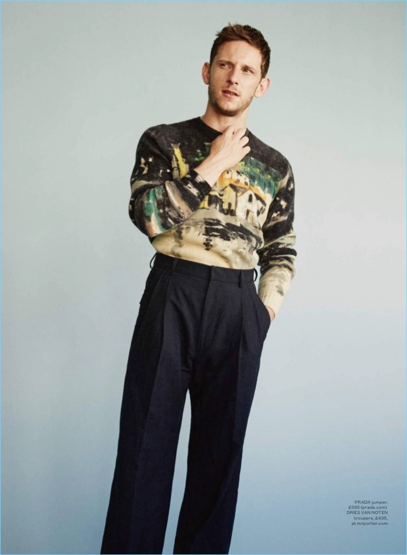 Actor Jamie Bell dons a Prada sweater with Dries Van Noten trousers.