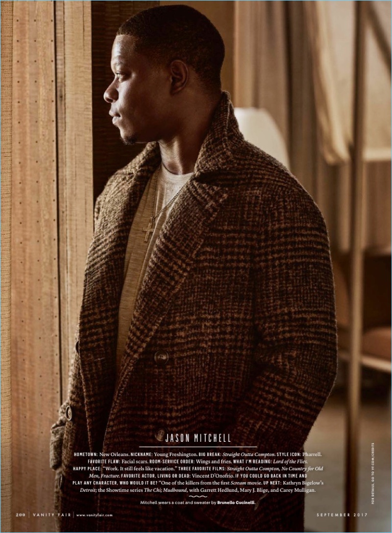 Jason Mitchell wears a coat and sweater by Brunello Cucinelli.