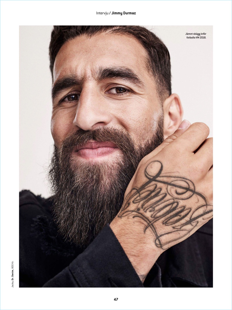 Ready for his close-up, Jimmy Durmaz rocks a black denim jacket by Dr. Denim.