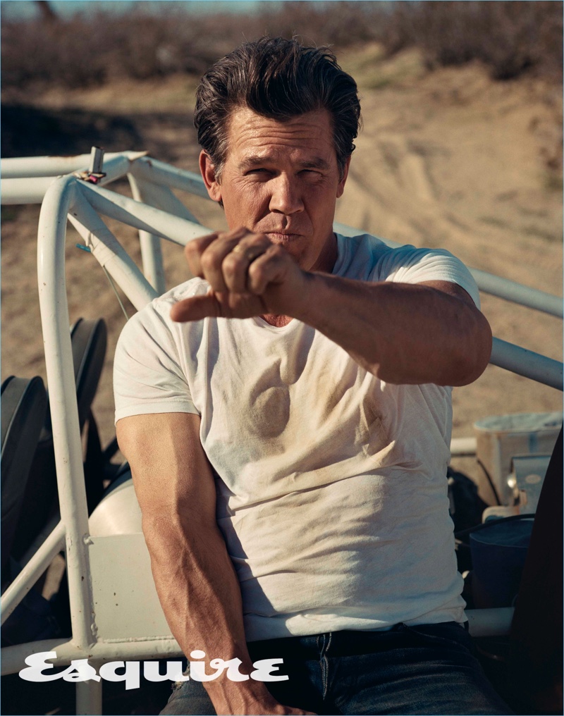 Actor Josh Brolin wears a Save Khaki United t-shirt with Fabric Brand & Co. jeans.