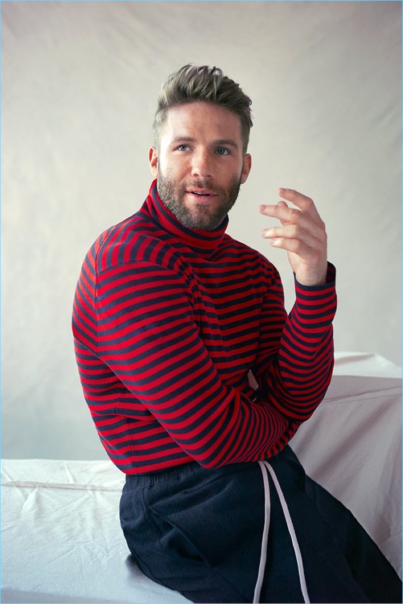 Sporting a striped Gucci sweater, Julian Edelman also wears Rick Owens drawstring trousers.