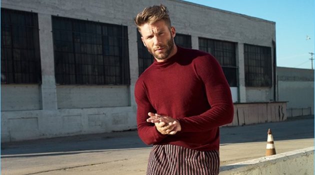 Julian Edelman Stars in Mr Porter Shoot, Talks Friendship with Tom Brady Making a case for red, Julian Edelman wears a Giorgio Armani sweater, Gucci trousers, and Dries Van Noten wingtip brogues.