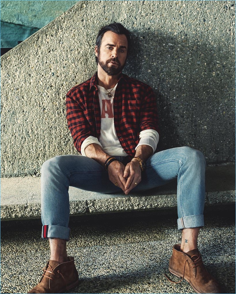 Bjorn Iooss photographs Justin Theroux in a Saint Laurent buffalo check shirt with Gucci jeans and a t-shirt by The Elder Statesman. Theroux also sports Marséll washed-suede chukka boots.