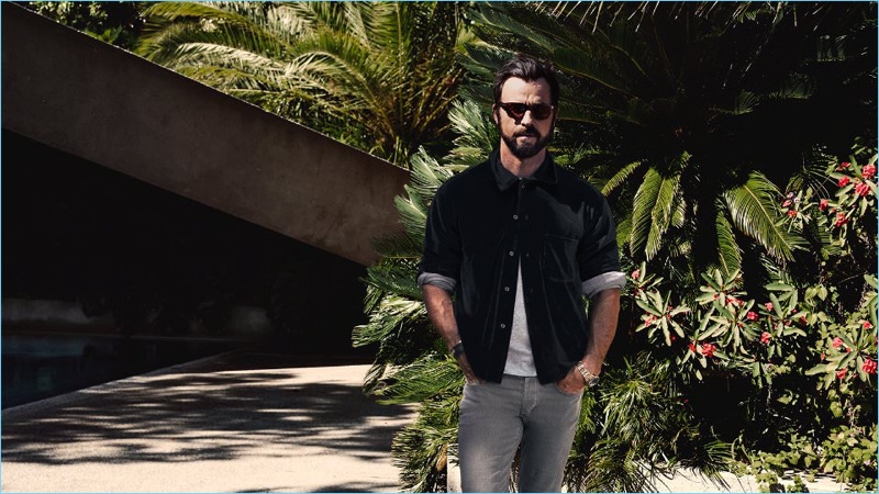 Actor Justin Theroux wears a Noons Goons velour shirt with an AMIRI t-shirt. Rag & Bone jeans and Tom Ford sunglasses complete his look.
