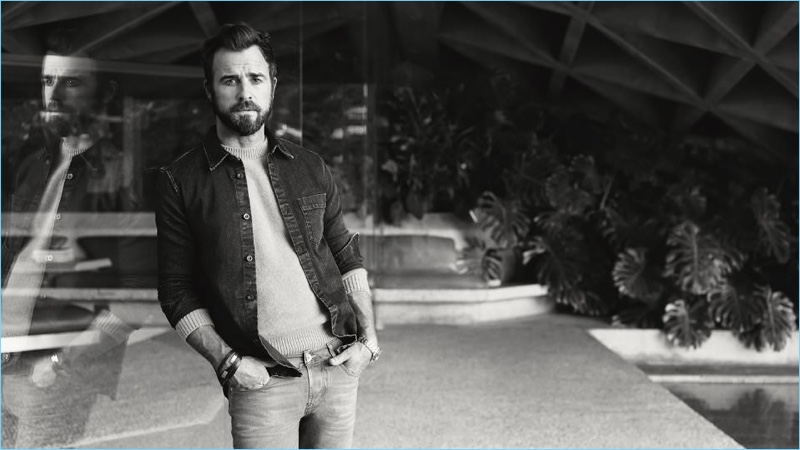 Justin Theroux wears an A.P.C. denim shirt and Rag & Bone denim jeans with a cashmere sweater by The Elder Statesman.