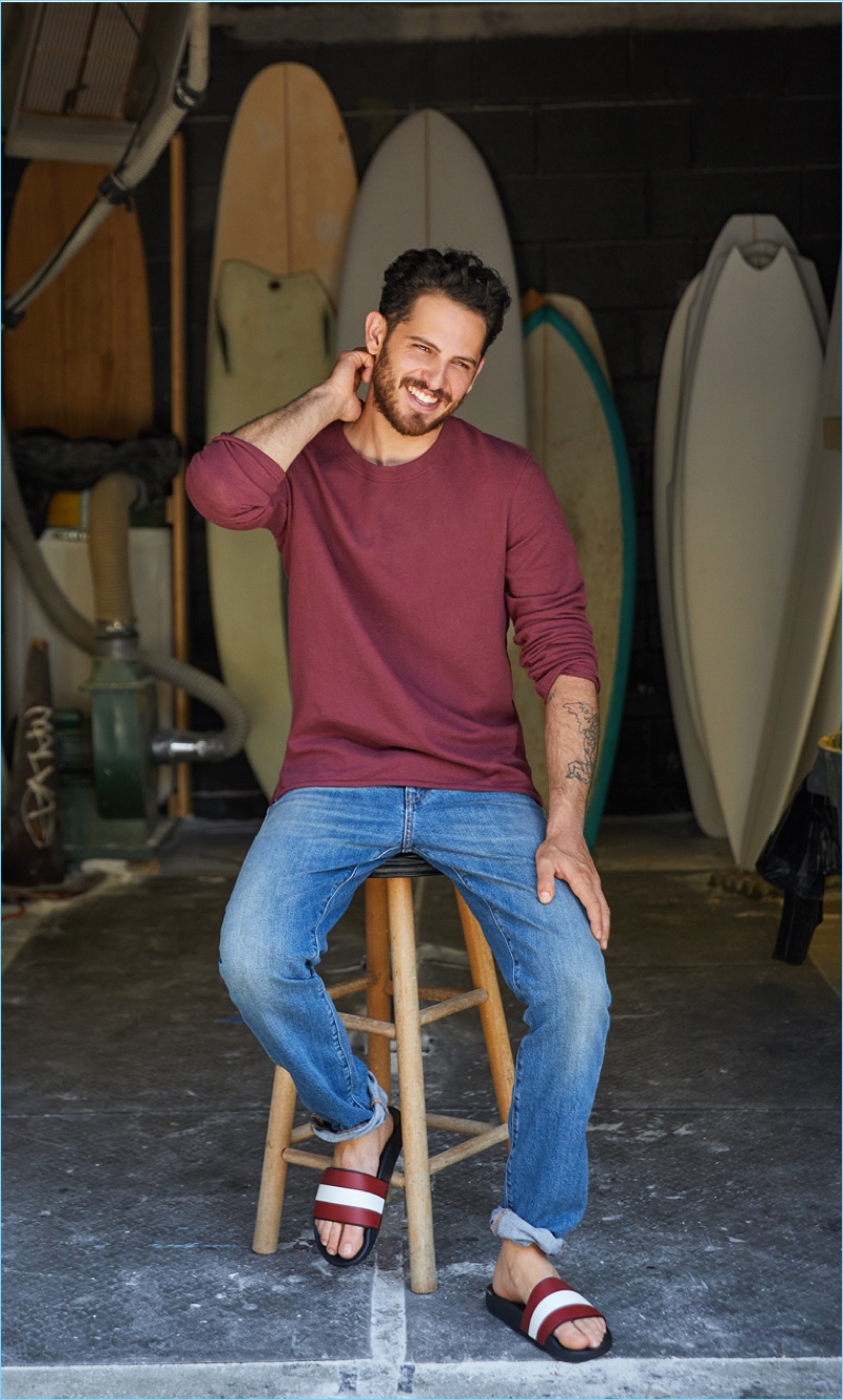 Play Around: Go casual and pair a Levi's Made & Crafted long-sleeve tee $118 and denim jeans $198 with Bally slides $175.