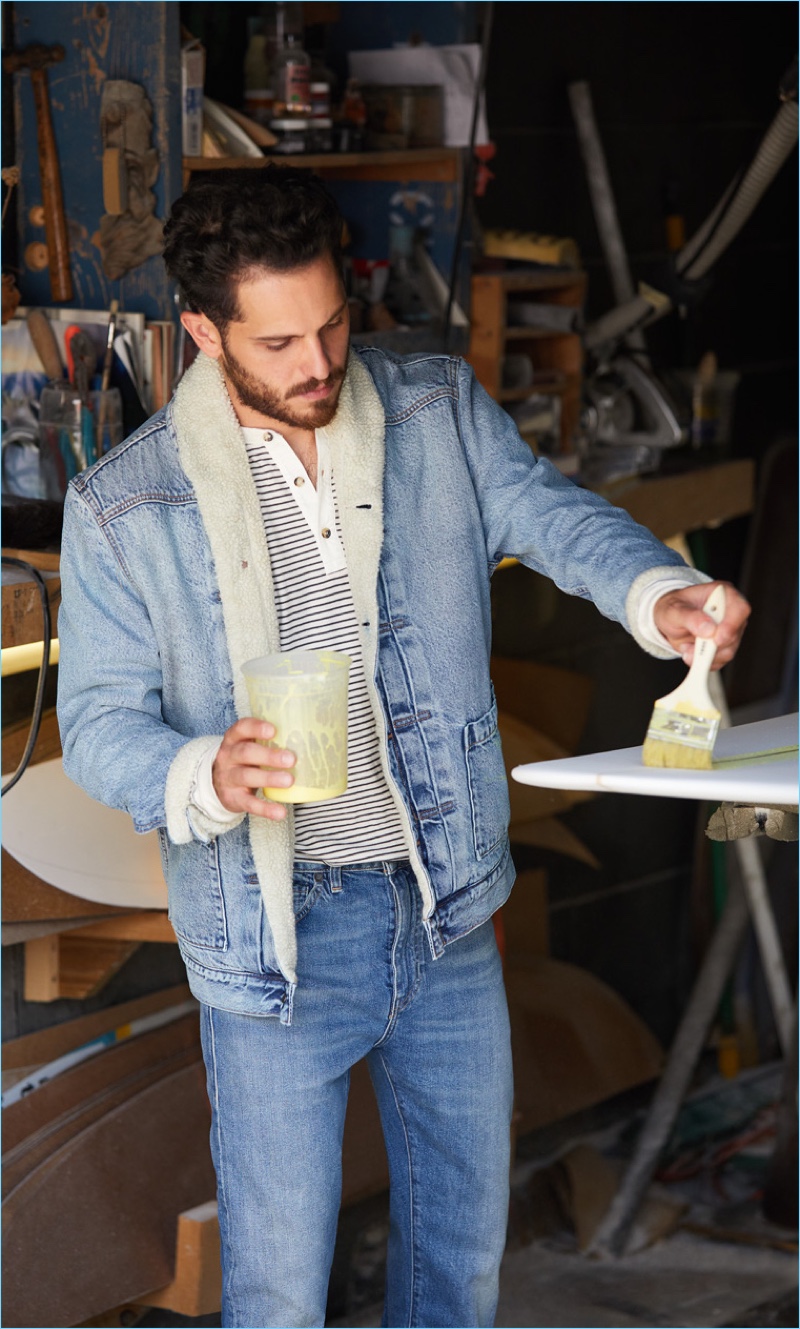Depend on Denim: Double down on denim with a Levi's Made & Crafted sherpa trucker jacket $298 and denim jeans $198. Perfect the denim casual look with a Levi's Red Tab striped henley $50.