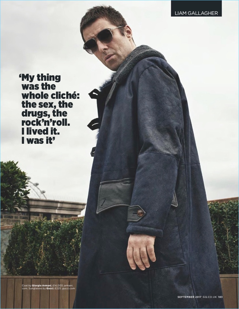 Dressing for winter, Liam Gallagher sports a Giorgio Armani coat with Gucci sunglasses.