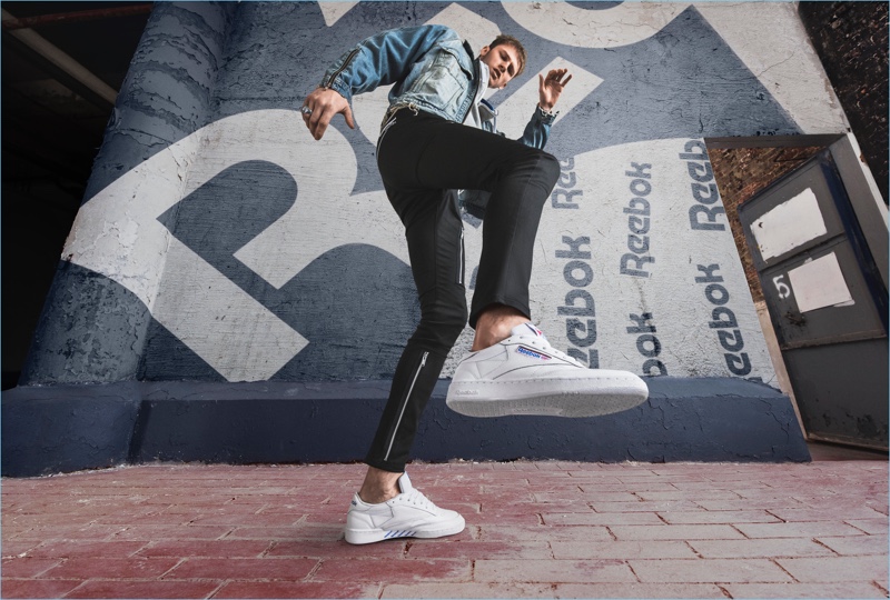 Busting a move, Machine Gun Kelly fronts Reebok's Club C Overbranded campaign.