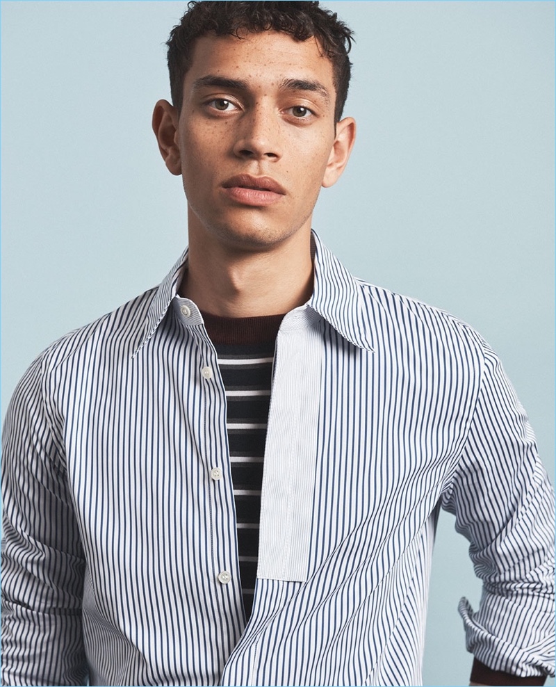 Marni lands in the spotlight with a new shoot from Matches Fashion. Here, Raith Clarke wears a Marni striped shirt and sweater.