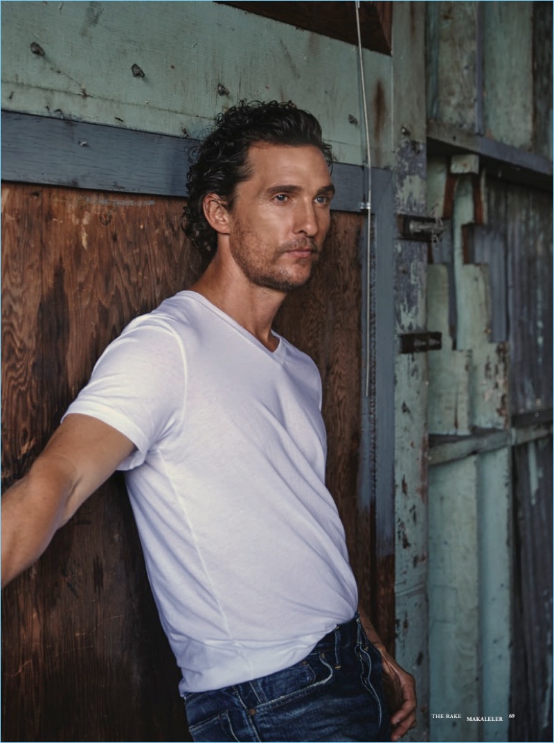 Embracing casual style, Matthew McConaughey sports a white tee.