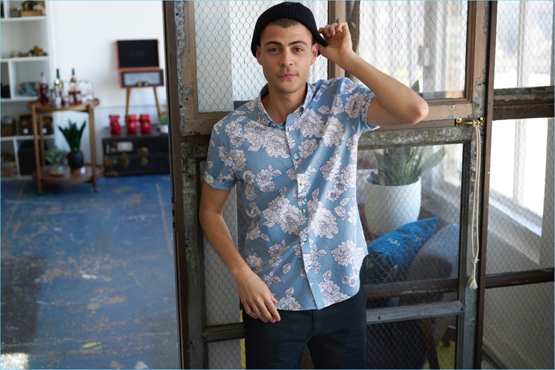 Model Micky Ayoub rocks a printed short-sleeve shirt for Original Penguin's fall-winter 2017 campaign.