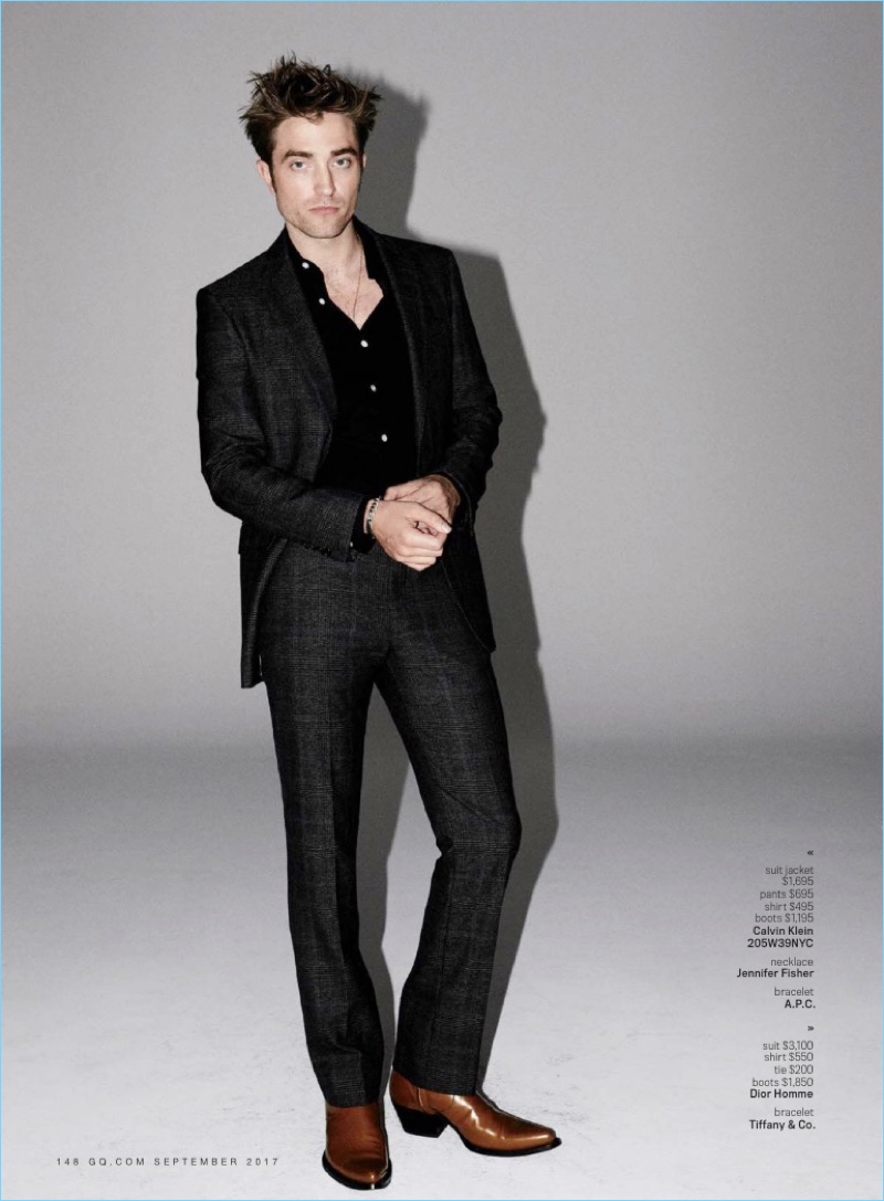 Suiting up for GQ, Robert Pattinson wears a Calvin Klein 205W39NYC look.