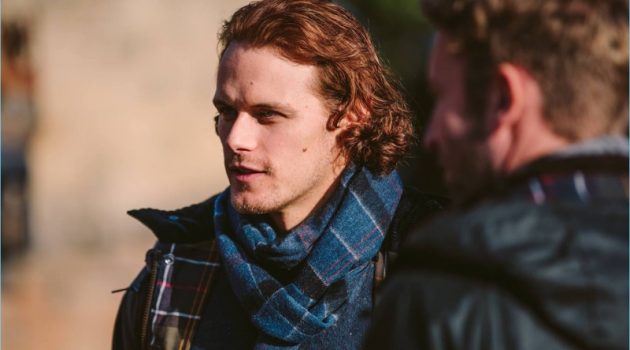 Sam Heughan Sports Barbour Tartans Collection for New Campaign Reuniting with Barbour, Sam Heughan sports tartan fashions from the brand's fall-winter 2017 collection.