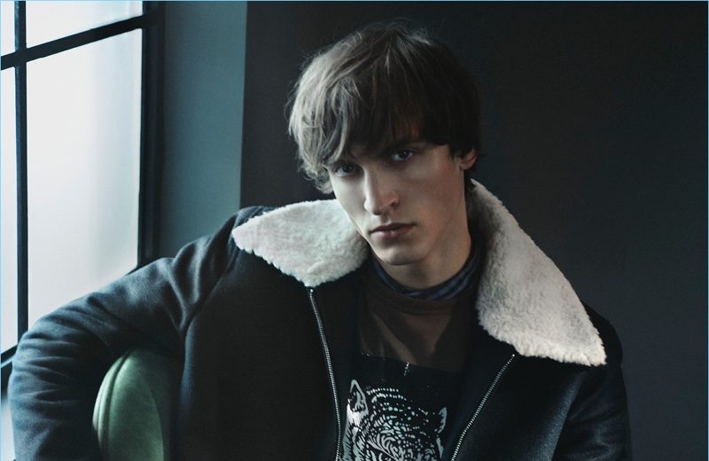 Rocking a shearling collared jacket, Tim Dibble fronts Tiger of Sweden's fall-winter 2017 campaign.