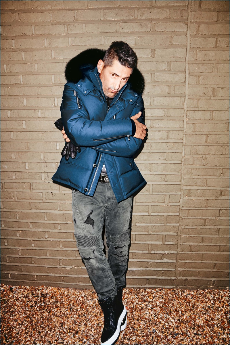 Keeping it casual, Tony Ward wears a Moose Knuckles jacket with Replay jeans.