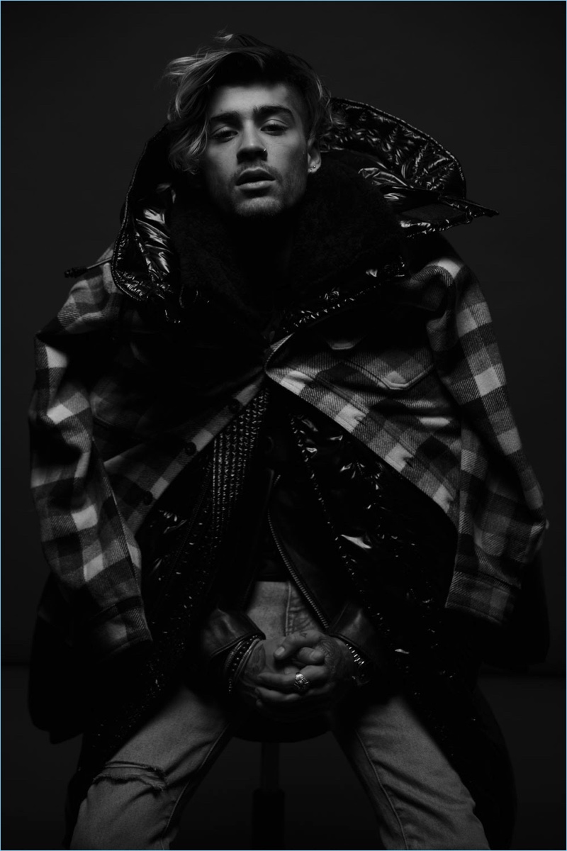 Layered for fall, Zayn Malik wears a Woolrich shirt with a Dsquared2 coat, Prada jacket, and Calvin Klein shirt. » Zayn Malik Covers VMAN, Talks New Music Layered for fall, Zayn Malik wears a Woolrich shirt with a Dsquared2 coat, Prada jacket, and Calvin Klein shirt.