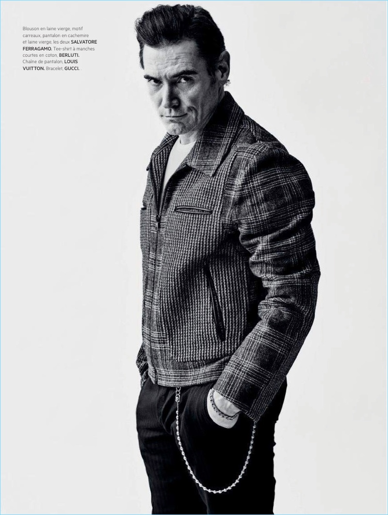 Connecting with L'Officiel Hommes Paris, Billy Crudup wears a jacket and trousers by Salvatore Ferragamo. He also dons a Berluti t-shirt.