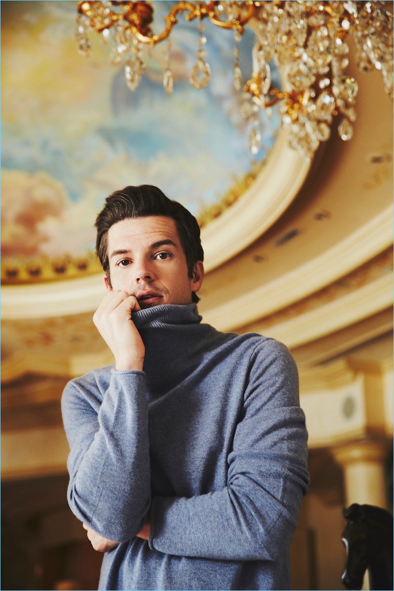 Getting cozy, Brandon Flowers wears a turtleneck sweater by Billy Reid.