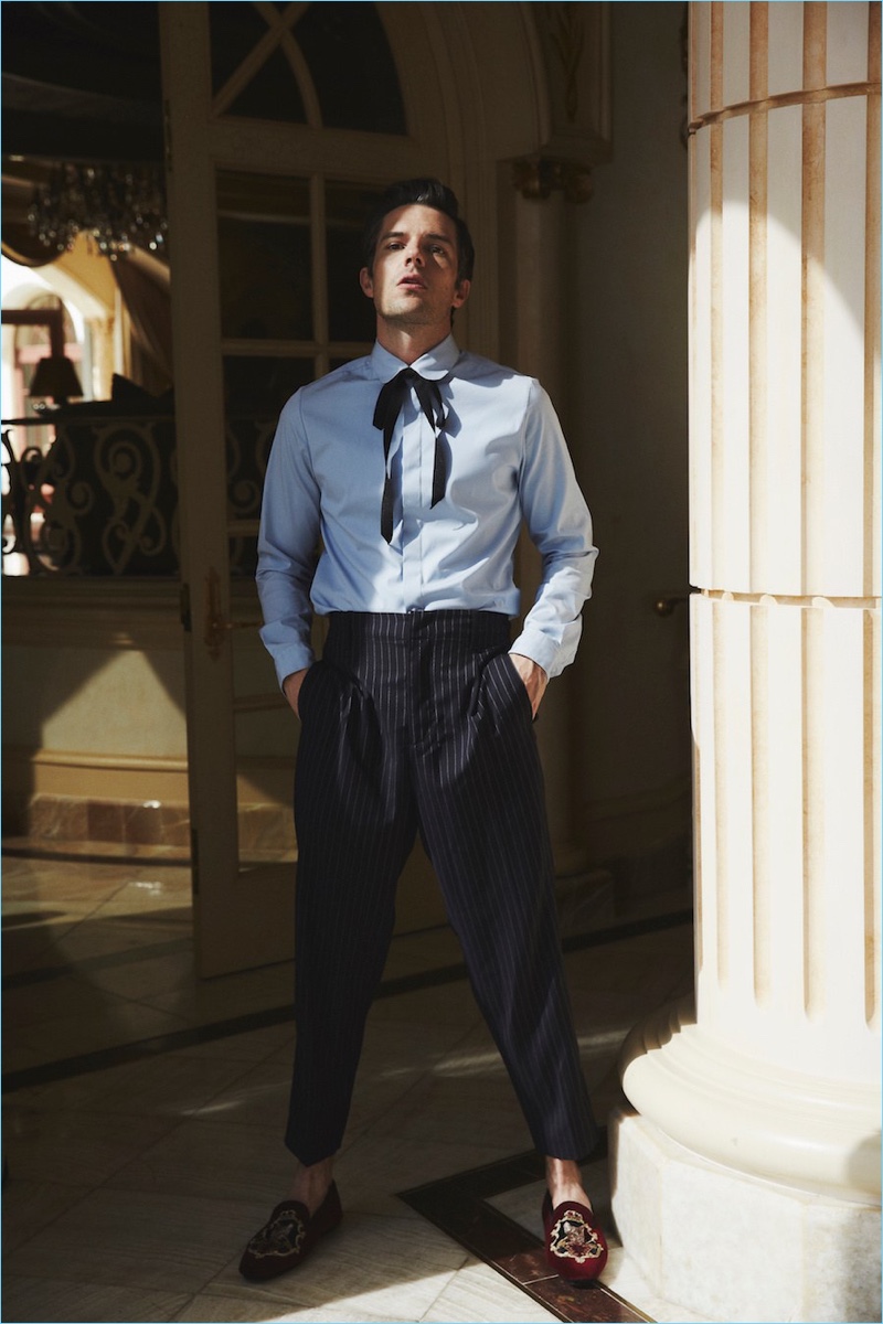 Sporting Dolce & Gabbana shoes, Brandon Flowers dons a shirt and tie by Gucci with 3.1 Phillip Lim trousers.