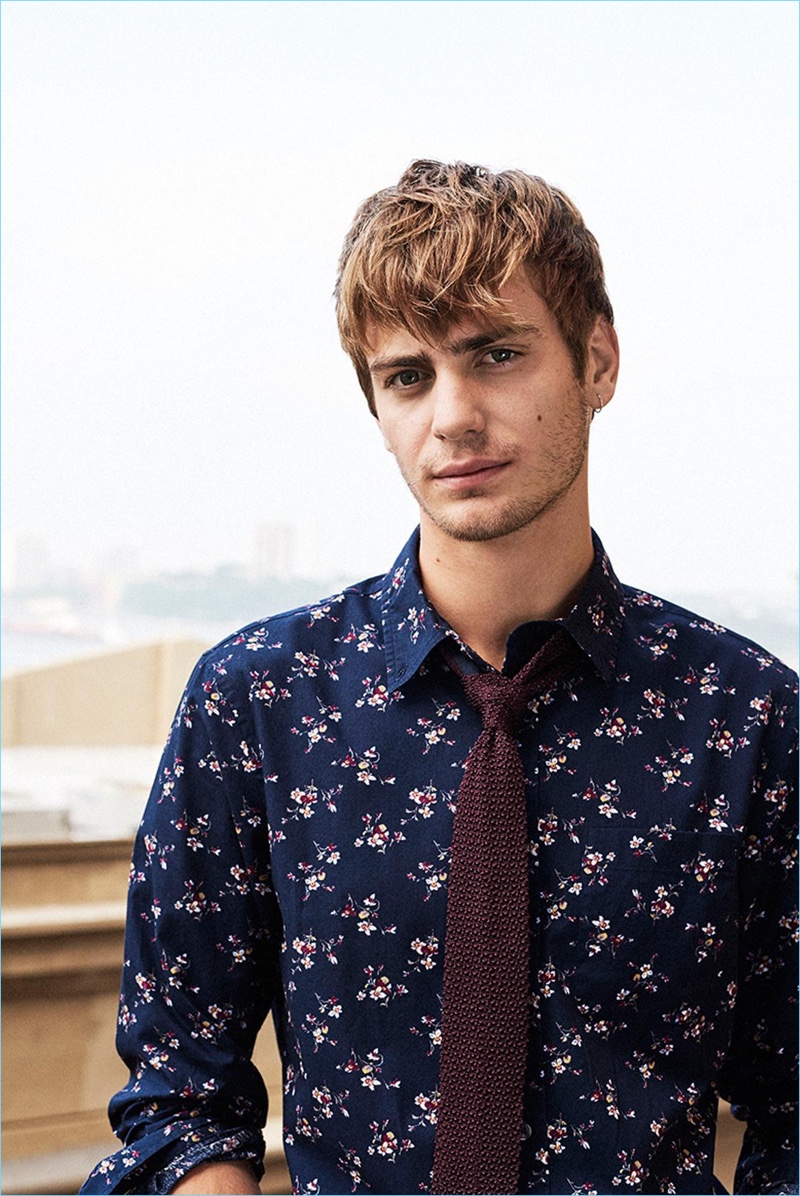 Club Monaco makes a smart statement with a slim posy floral shirt $89.50 and a plum seed stitch tie $89.50.