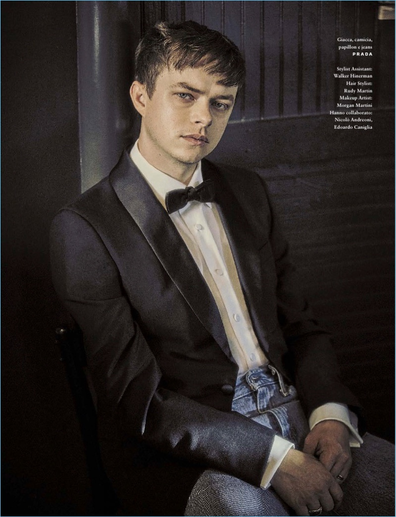 Juxtaposing styles, Dane DeHaan wears a tuxedo jacket and jeans by Prada.