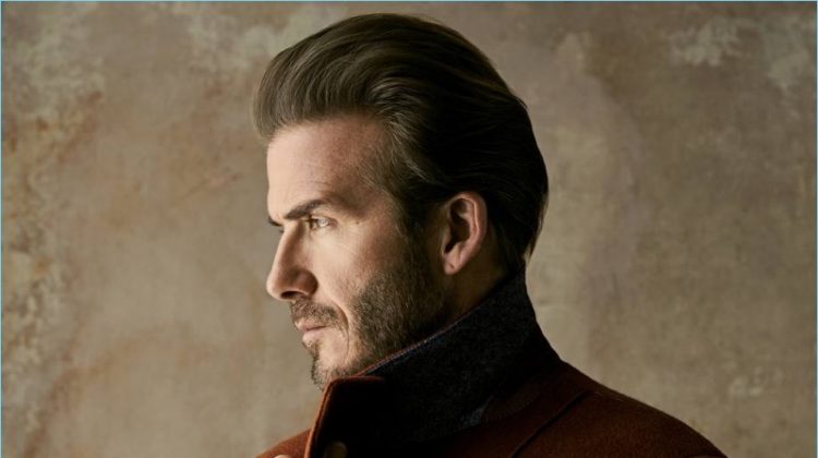 Delivering a side profile, David Beckham dons an Ermenegildo Zegna Couture coat.