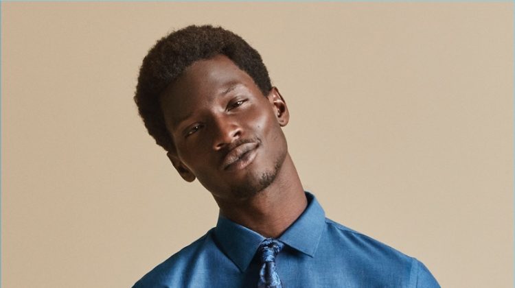 Adonis Bosso wears a smart shirt and tie for Express' fall-winter 2017 campaign.