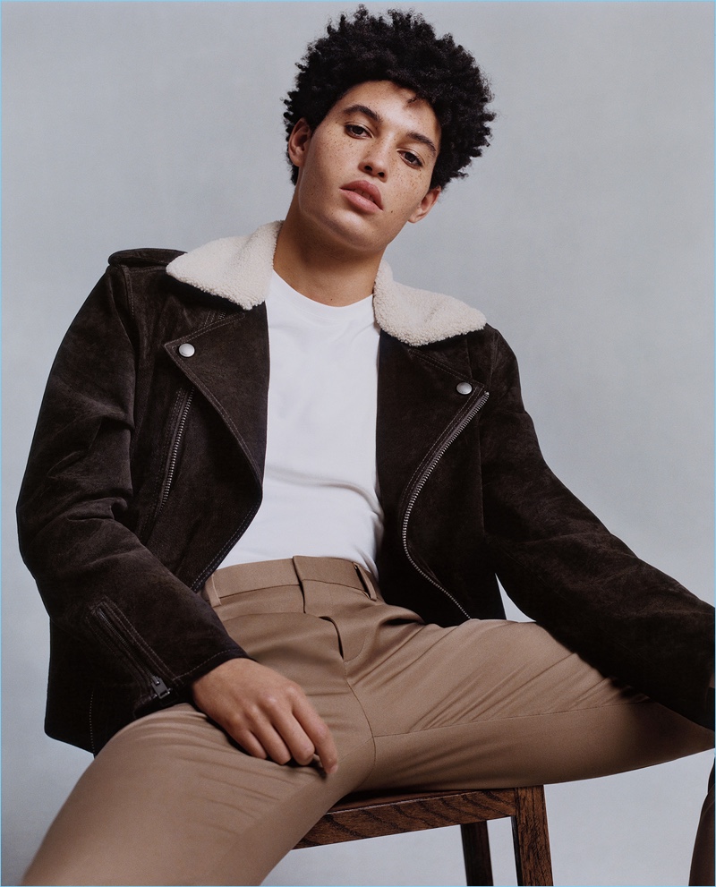 Markel Williams goes casual in a biker jacket and khaki pants for Express' fall-winter 2017 campaign.