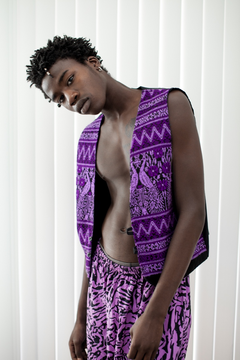Cheikh wears a vintage vest and pants.
