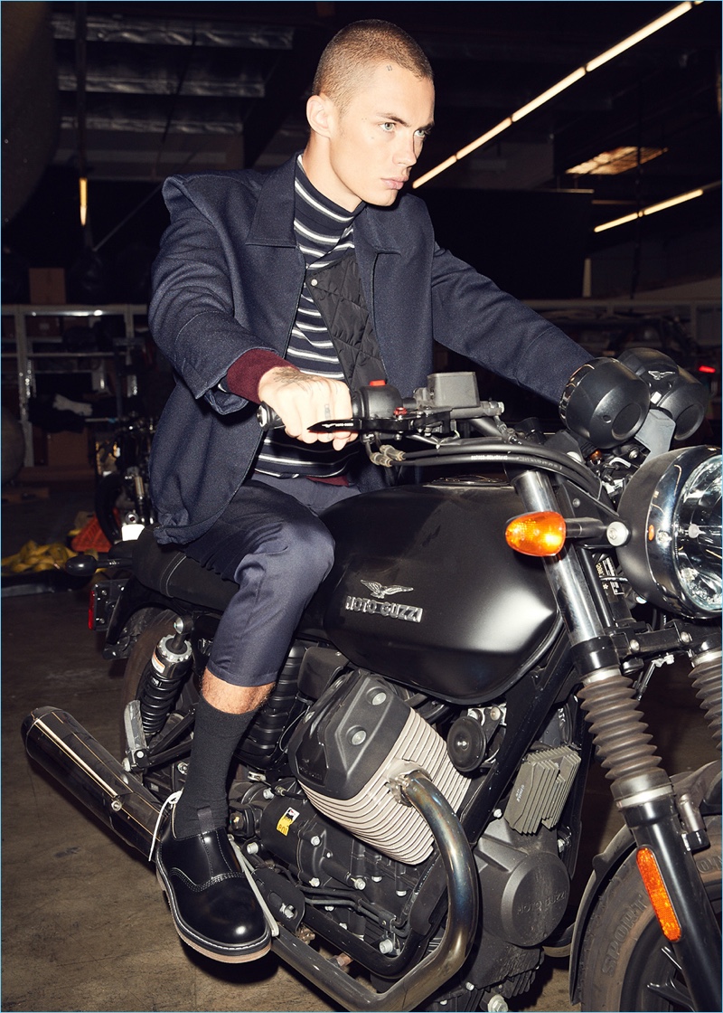 Simon Kotyk takes the driver's seat in a Marni bomber jacket and striped knit. He also wears OAMC cropped pants and Sacai x Hender Scheme leather oxfords.
