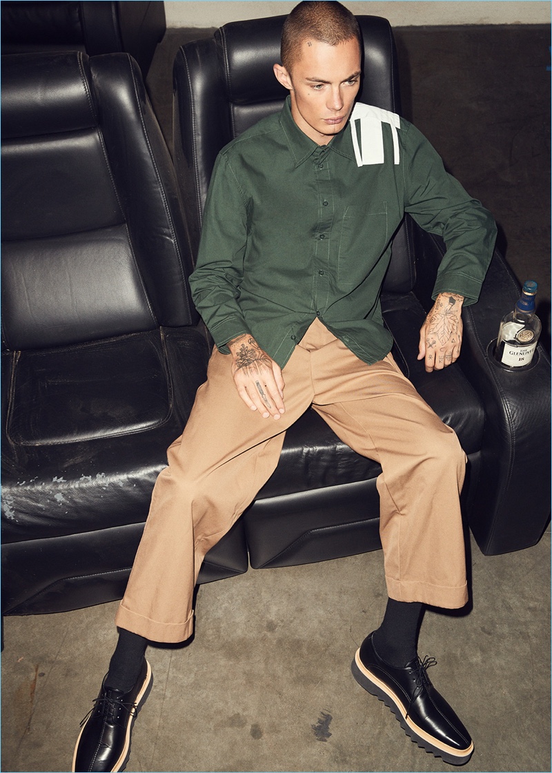 Embracing simple style, Simon Kotyk wears a Craig Green shirt and trousers with Stella McCartney platform dress shoes.