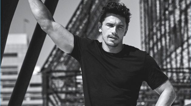 James Franco Covers GQ Australia, Talks Being a Workaholic Taking to a roof top, James Franco wears a Giorgio Armani t-shirt with Fabric Brand & Co. denim jeans.