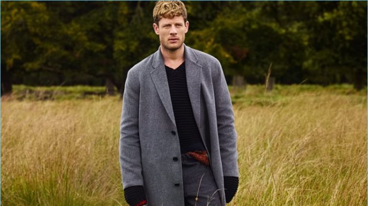 Embracing the oversize trend, James Norton wears an Acne Studios overcoat, Dries Van Noten trousers, and a Prada sweater.
