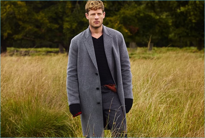 Embracing the oversize trend, James Norton wears an Acne Studios overcoat, Dries Van Noten trousers, and a Prada sweater.