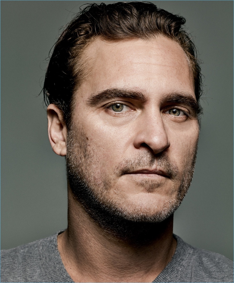 Actor Joaquin Phoenix wears a simple t-shirt by Saint Laurent.