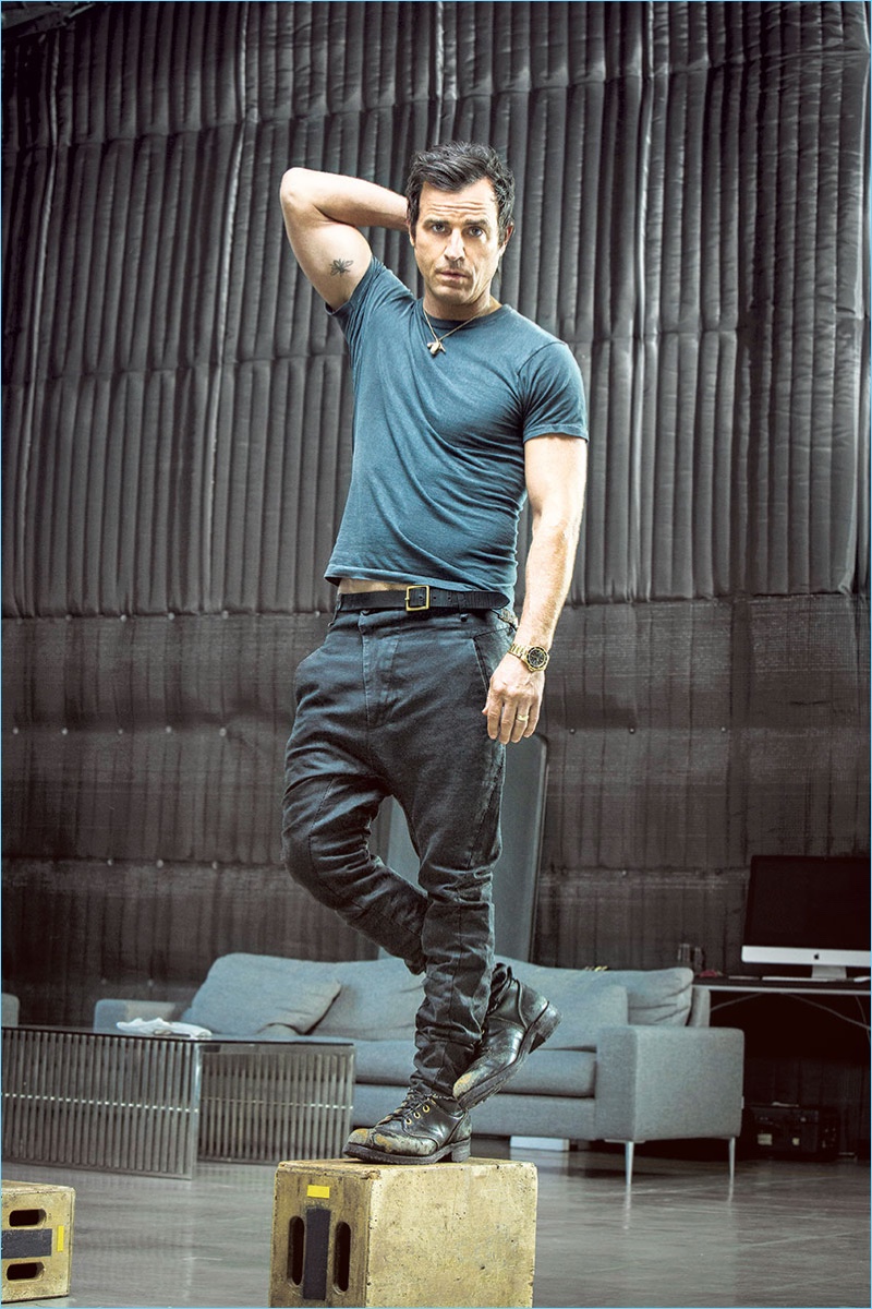 Connecting with Alexa, Justin Theroux rocks a vintage t-shirt, combat boots, and belt with Masnada pants.