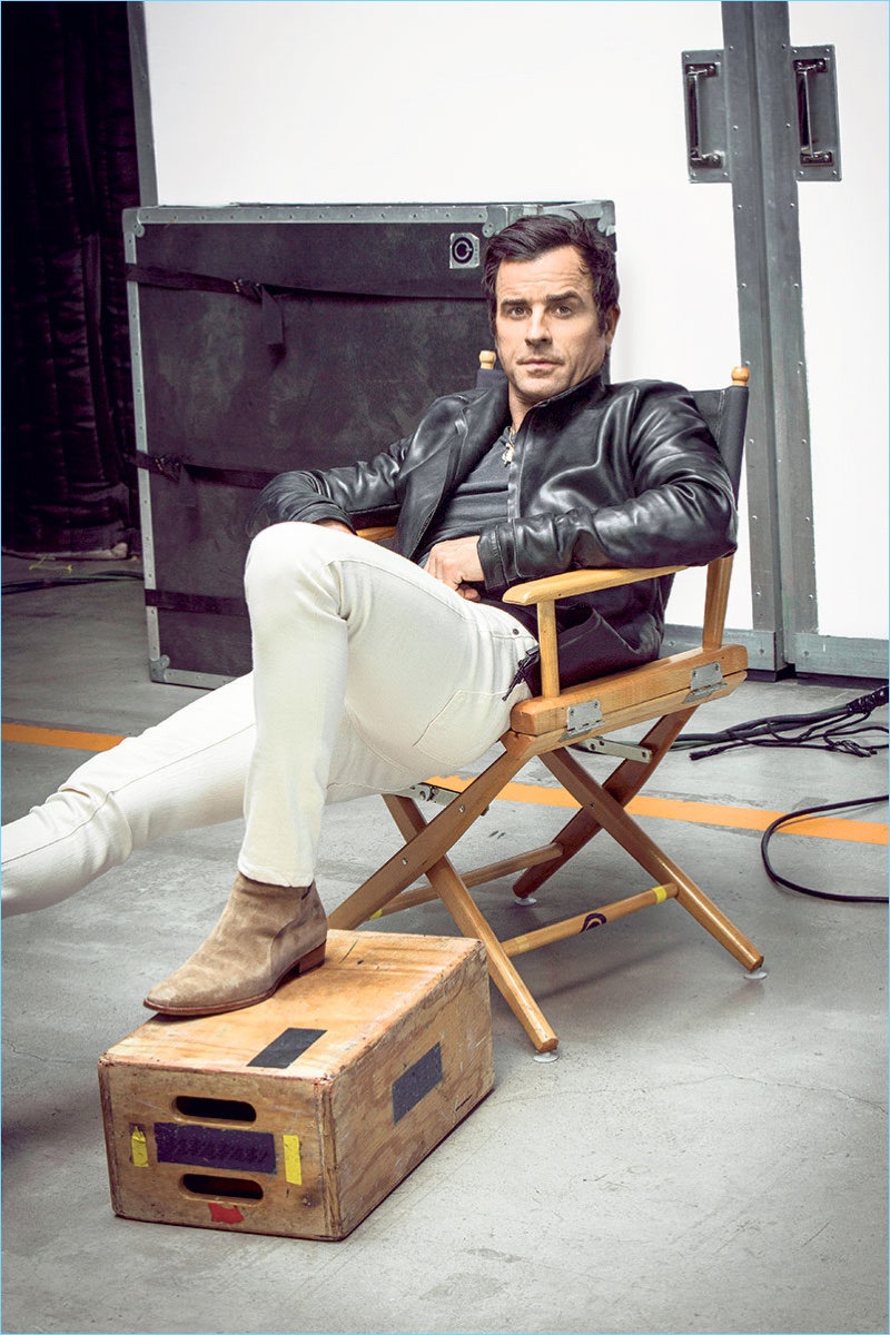 Relaxing, Justin Theroux wears a Ajmone leather jacket with a vintage t-shirt, G-Star jeans, and his own boots.