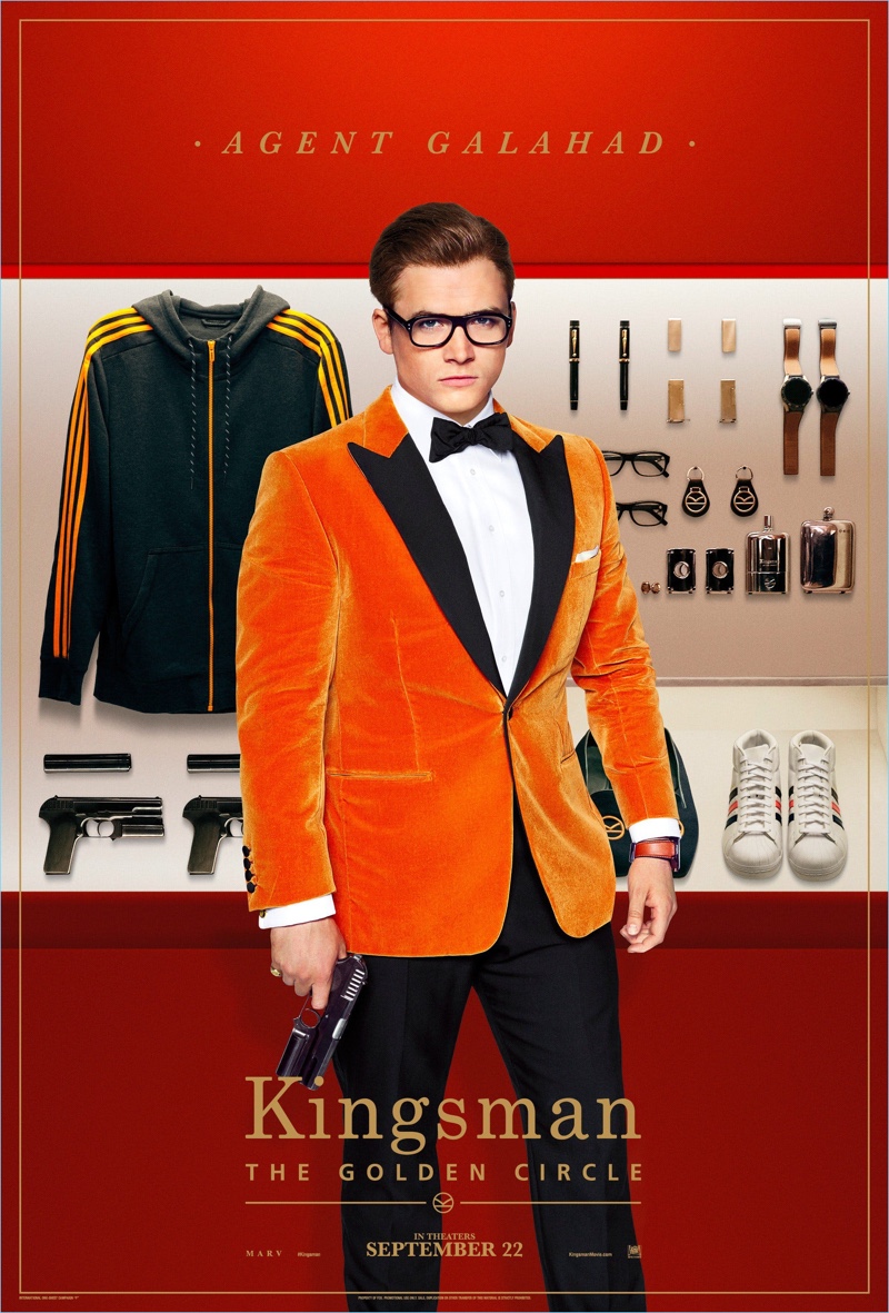 Playing Gary 'Eggsy' Unwin, Taron Egerton dons a Kingsman orange velvet tuxedo jacket $1,995, and trousers $650. Egerton also wears Kingsman + Cutler and Gross square-frame glasses $375.