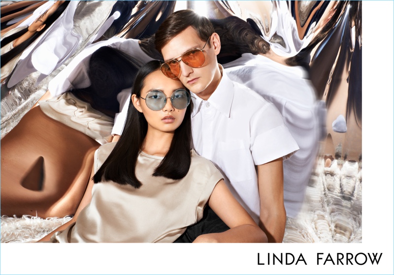 Models Ling Ling and Yannick Abrath embrace for Linda Farrow's fall-winter 2017 campaign.