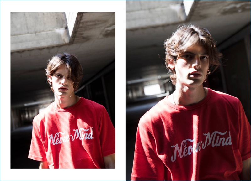 A casual vision, Andrea Silenzi rocks a red "Never-Mind" t-shirt $173 from ´Etudes.