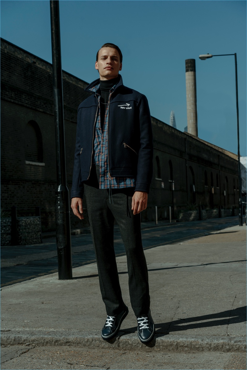 Going casual, Paul F. models a Lanvin "New Wave" embroidered jacket $1,075 and turtleneck sweater $355. He also rocks a Lanvin plaid shirt $495, trousers $460, and high-top leather sneakers $546. » Matches Fashion Launches Exclusive Lanvin Capsule Collection Going casual, Paul F. models a Lanvin "New Wave" embroidered jacket $1,075 and turtleneck sweater $355. He also rocks a Lanvin plaid shirt $495, trousers $460, and high-top leather sneakers $546.