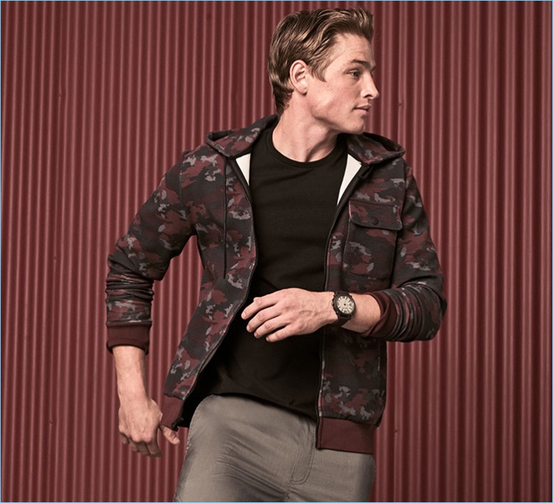 A sporty vision, Patrick O'Donnell wears a Kenneth Cole Reaction camouflage print hoodie $149 and t-shirt $24.