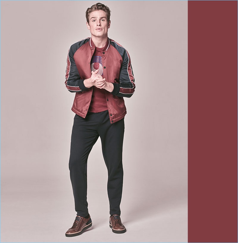 Ben Sherman is front and center for Macy's style edit. Model Patrick O'Donnell wears a Ben Sherman graphic t-shirt $35, color-blocked bomber jacket $149, and joggers $79. 