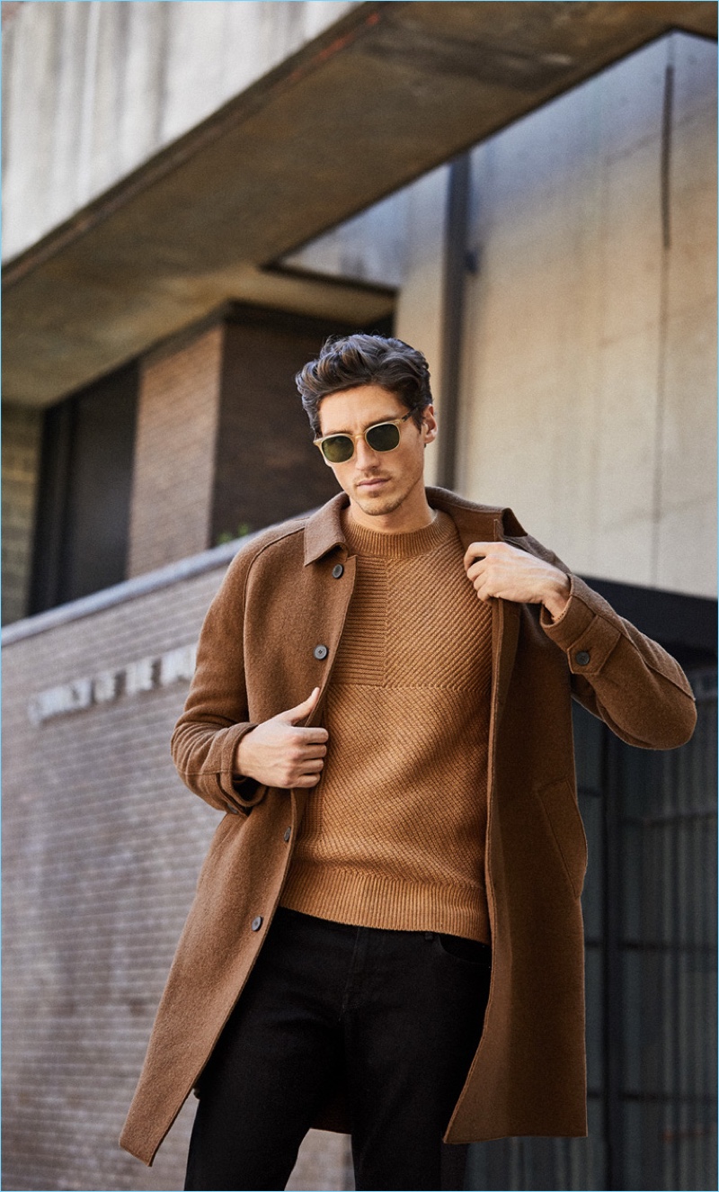 King Camel: Embrace fall hues with a Harris Wharf London coat $700 and Levi's Made & Crafted sweater $228. Incorporate essentials with Frame jeans $199 and Oliver Peoples sunglasses $430.